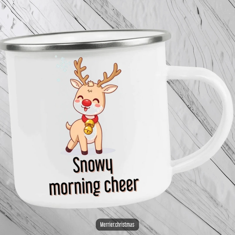 Funny Jingle Bell Reindeer Camping Mug: a durable mug with a cute reindeer humorously tossing a snowflake, for holiday enjoyment.