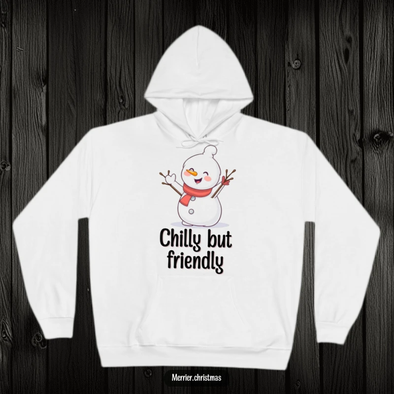 Funny hoodie with a delighted snowman character waving energetically with a twig arm, embodying the spirit of a snowy day.