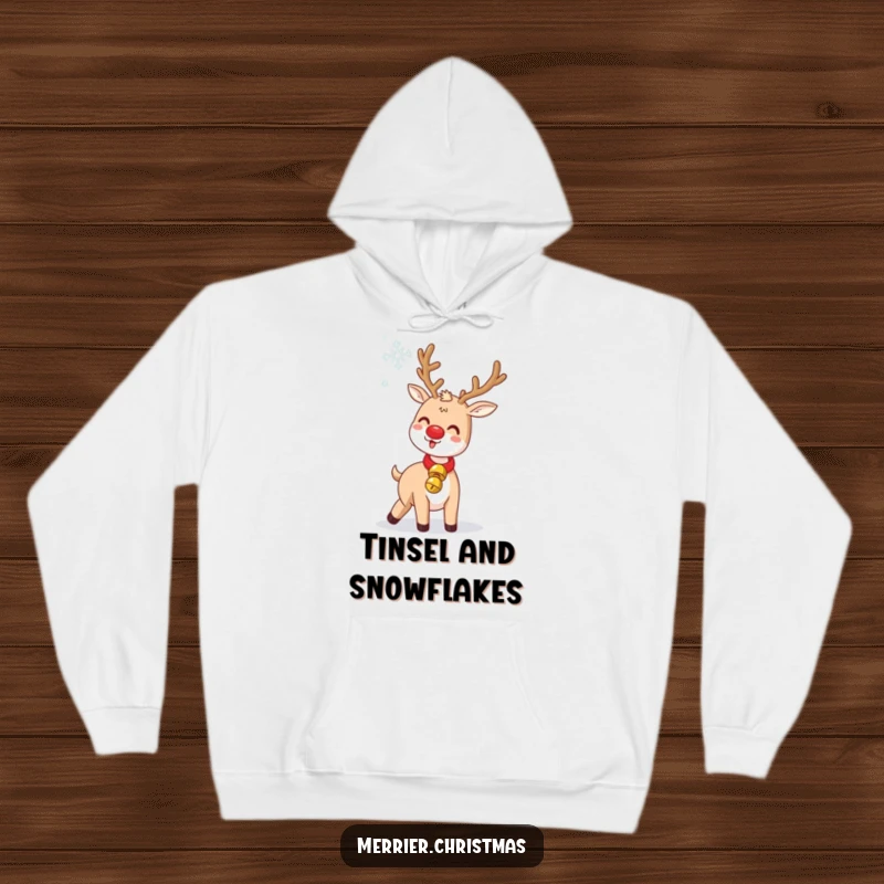 Funny Jingle Bell Reindeer Hoodie: a warm hoodie featuring a cute reindeer humorously tossing a snowflake, with a jingle bell collar.