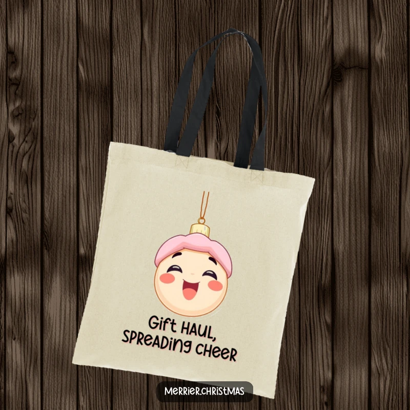 Funny tote bag showing an excited Christmas ornament character with a wide smile, ideal for carrying holiday items with humorous flair.